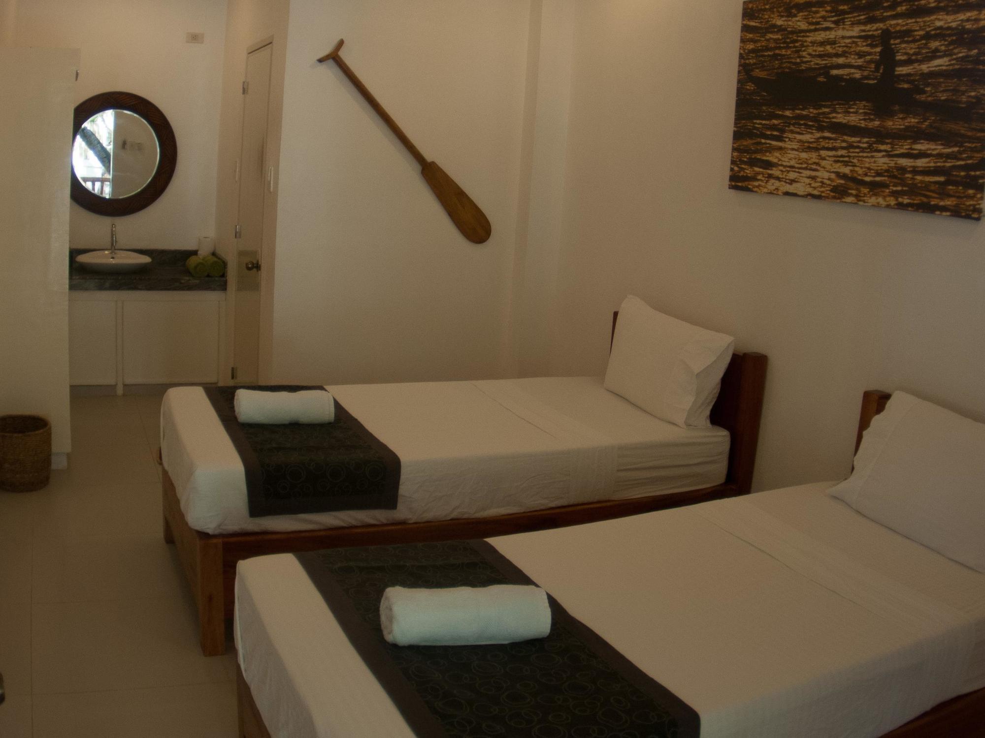 Evolution Dive And Beach Resort Малапаскуа Айлънд Екстериор снимка